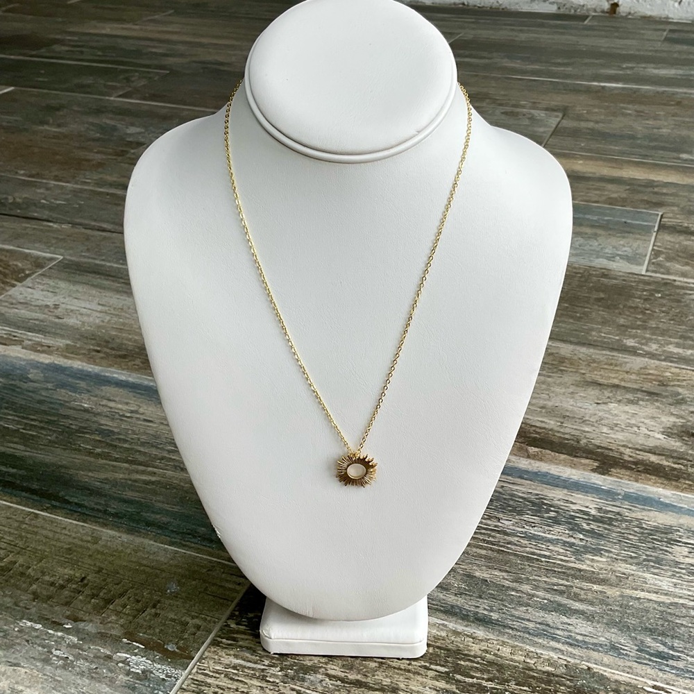Elegant Gold Sunburst Pendant Necklace